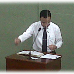Pastor Carlos preaching at New Life